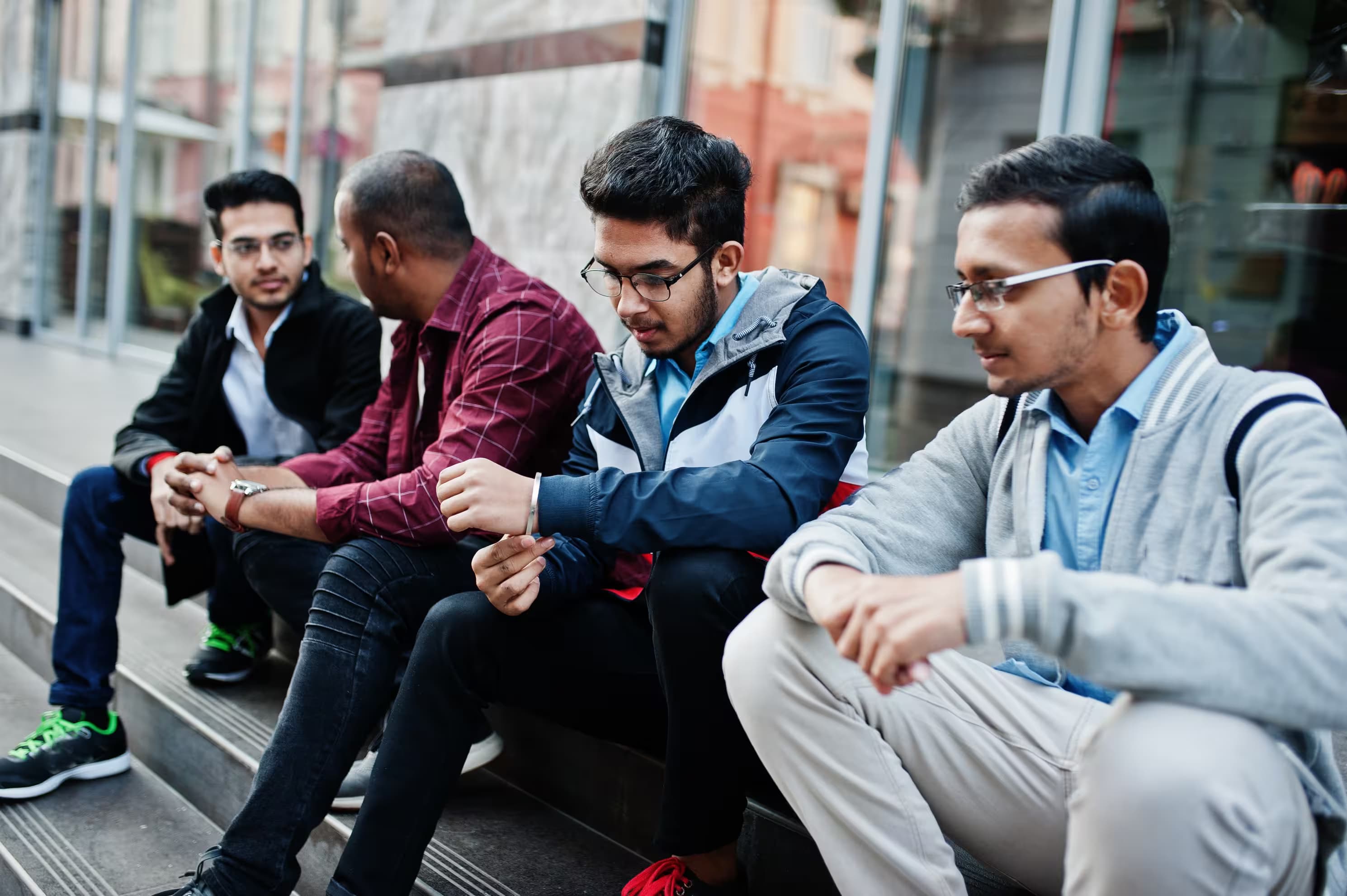Students talking together on campus steps