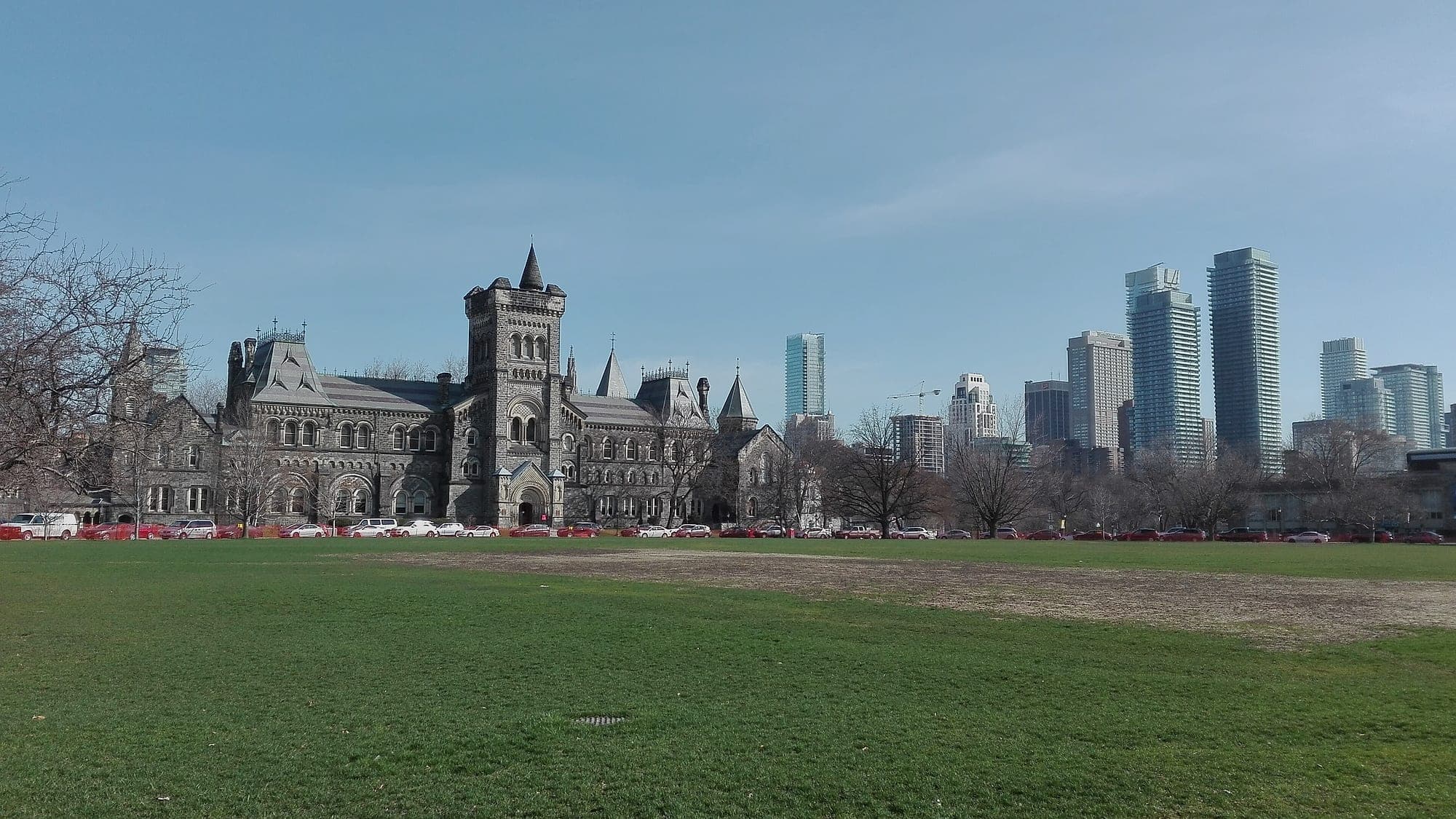 University College at the University of Toronto, with the city skyline beyond
