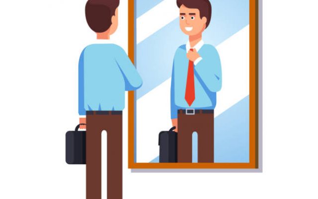 Man looking in mirror